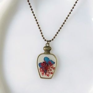 🔥4/$20 Vintage bottle pendant with butterfly